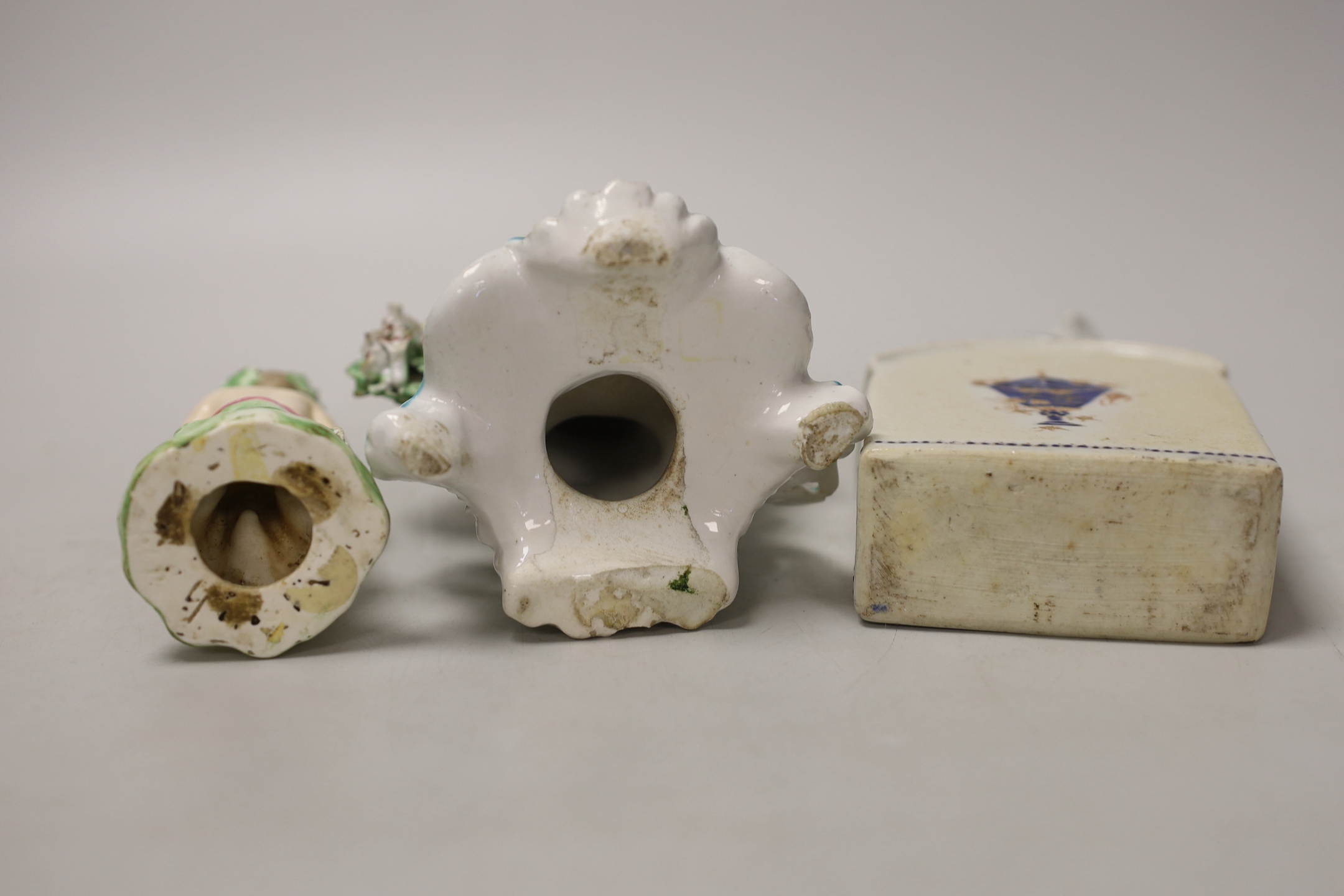Two late 18th century Derby figures of cherubs and a Chinese Export porcelain caddie and cover